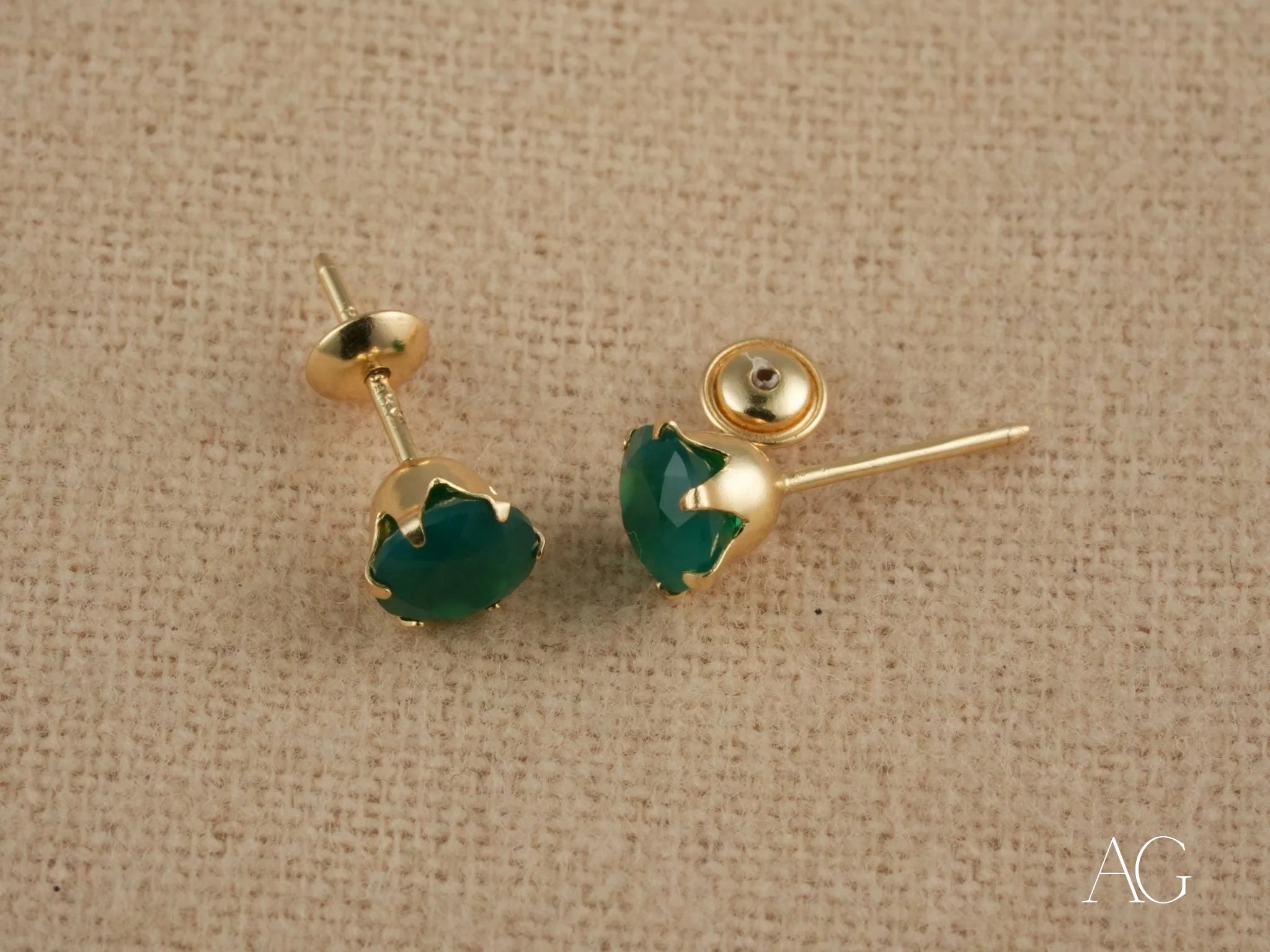 Two 18k Gold Green CZ Stud Earrings showcasing the beauty of Verdant Sparkle
