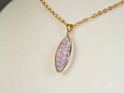 Violet Essence Amethyst Pendant featuring lavender crystals in 18k gold setting