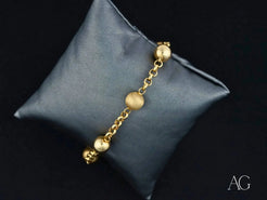 Gold bracelet with spherical beads and spring ring clasp for women in 18k solid gold